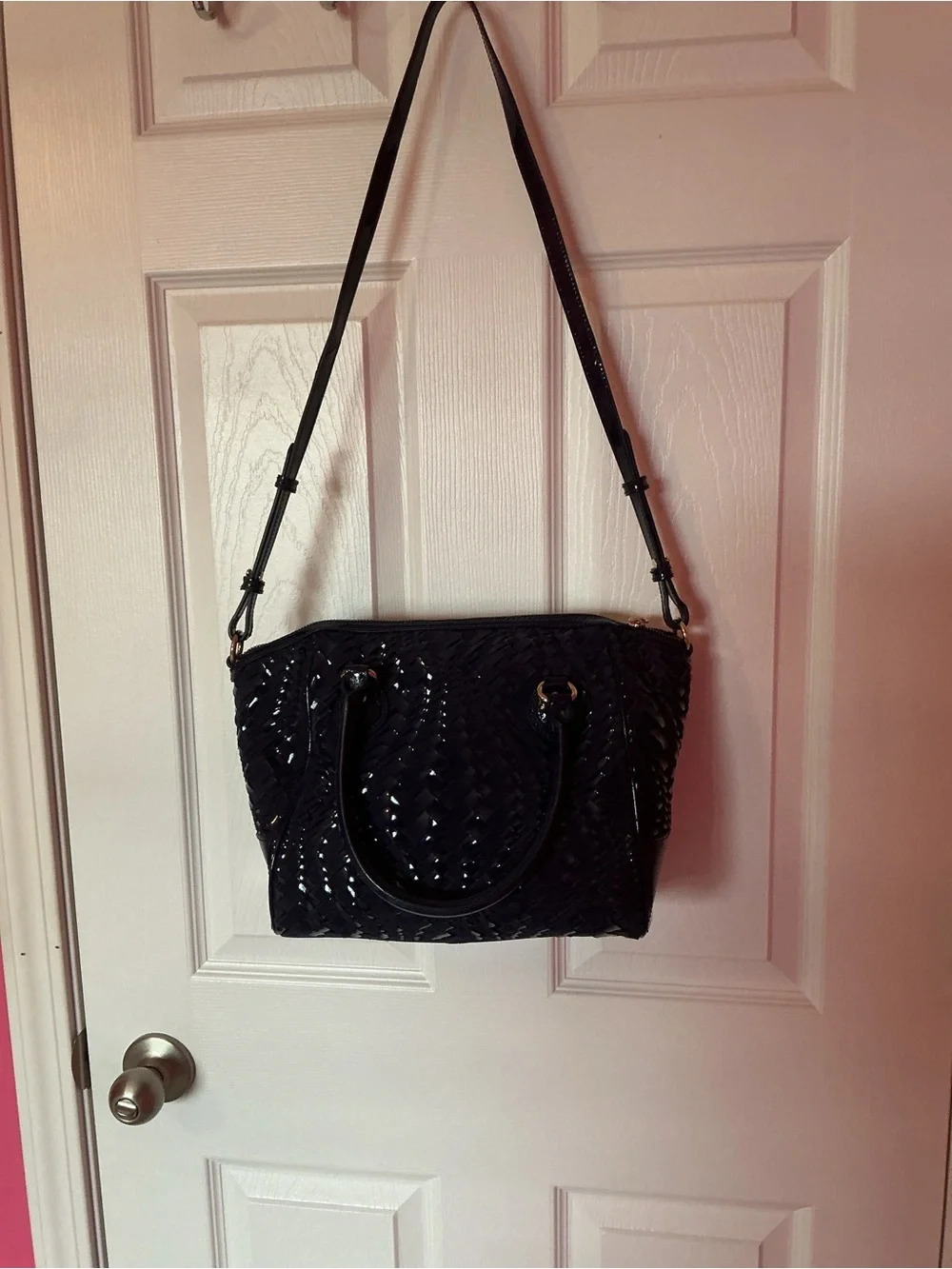 Cole Haan Navy Patent leather shoulder Bag with Orange Lining.